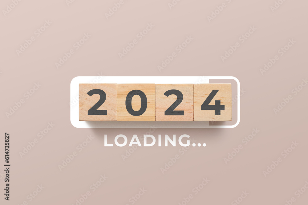 2024 loading bar with wooden cubes on pink flare background. 2024 loading bar with wooden cubes on pink flare background.