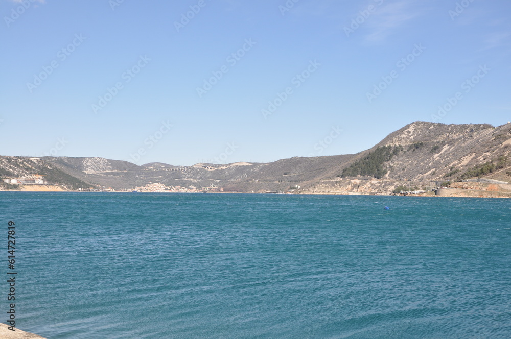 Panoramic view of Bakar city with rough Adriatic sea in Croatia.Rough Adriatic Sea and Bura wind in Bakar gulf. Panoramic view of Bakar city with rough Adriatic sea in Croatia.Rough Adriatic Sea and Bura wind in Bakar gulf.