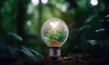 Light bulb with tree in hands of businessman, Green energy, eco-friendly business, Business and Environmental concept