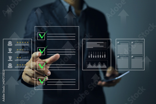 Slika na platnu A businessman click green check mark to evaluating a vendor or supplier industri