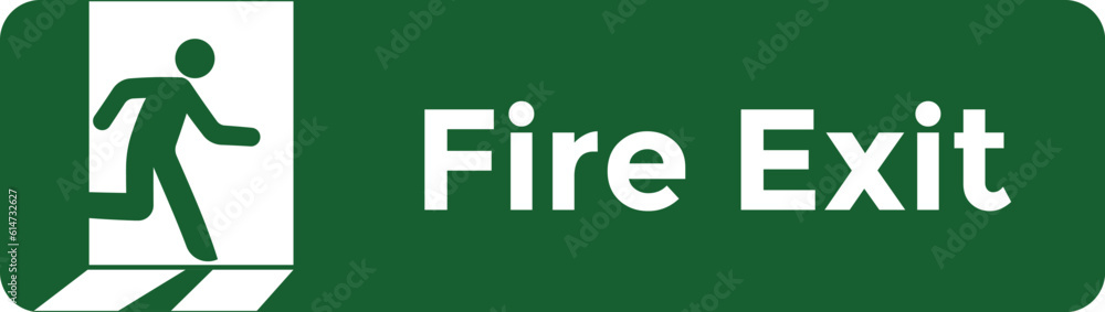 Green emergency exit sign on white