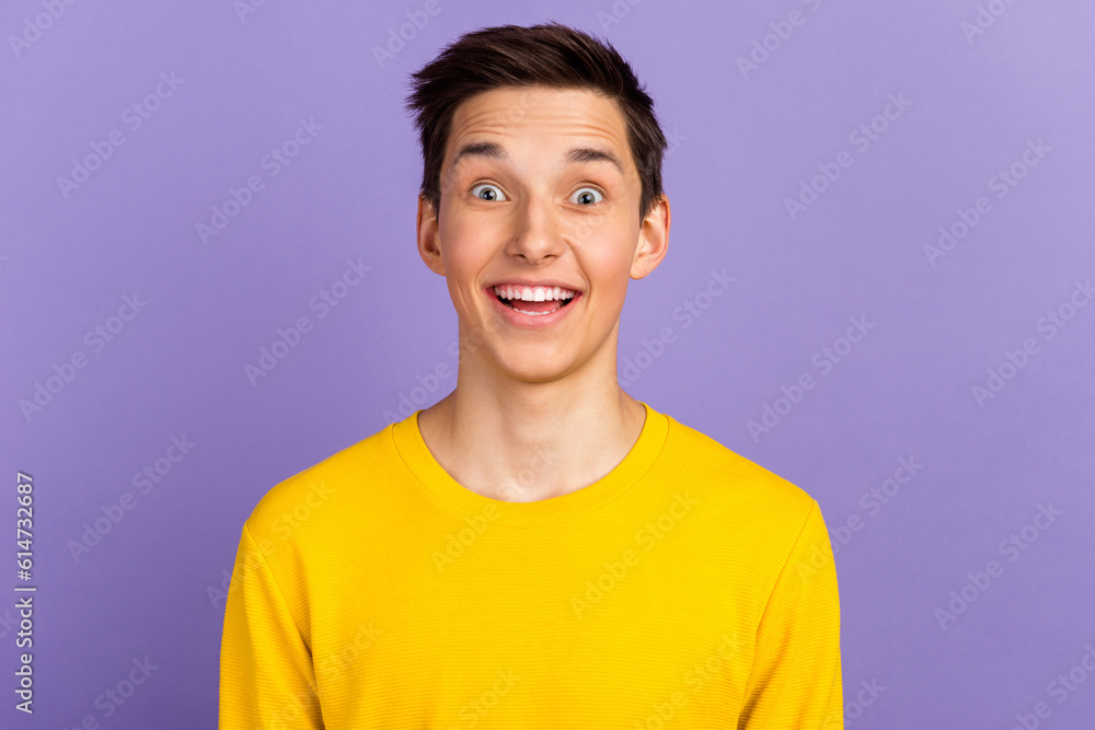 Portrait of young impressed guy see incredible black friday adverts open mouth isolated on bright color background Portrait of young impressed guy see incredible black friday adverts open mouth isolated on bright color background