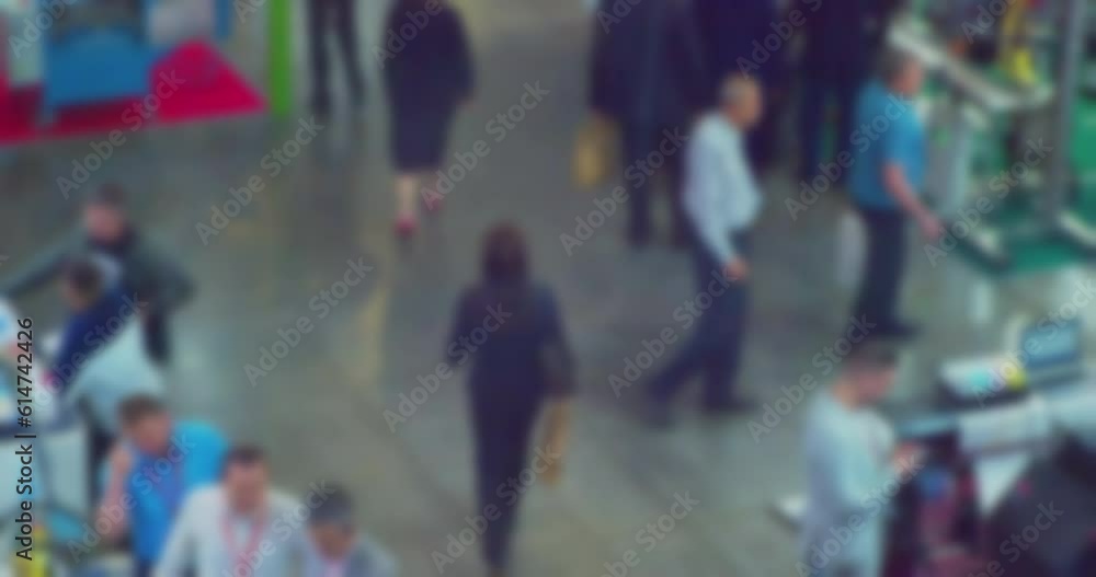 time lapse.modern city life.a crowd of business people who move around inside a large hall at rush hour.blurry defocused business video.view from above. time lapse.modern city life.a crowd of business people who move around inside a large hall at rush hour.blurry defocused business video.view from above.