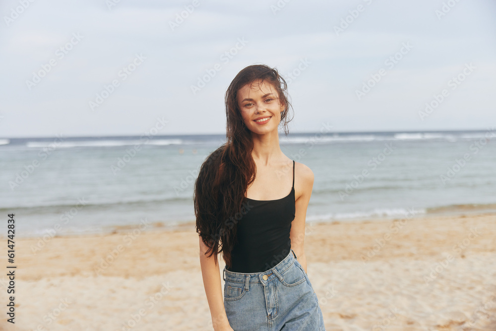 woman sunset caucasian lifestyle smile ocean vacation sand sea summer beach