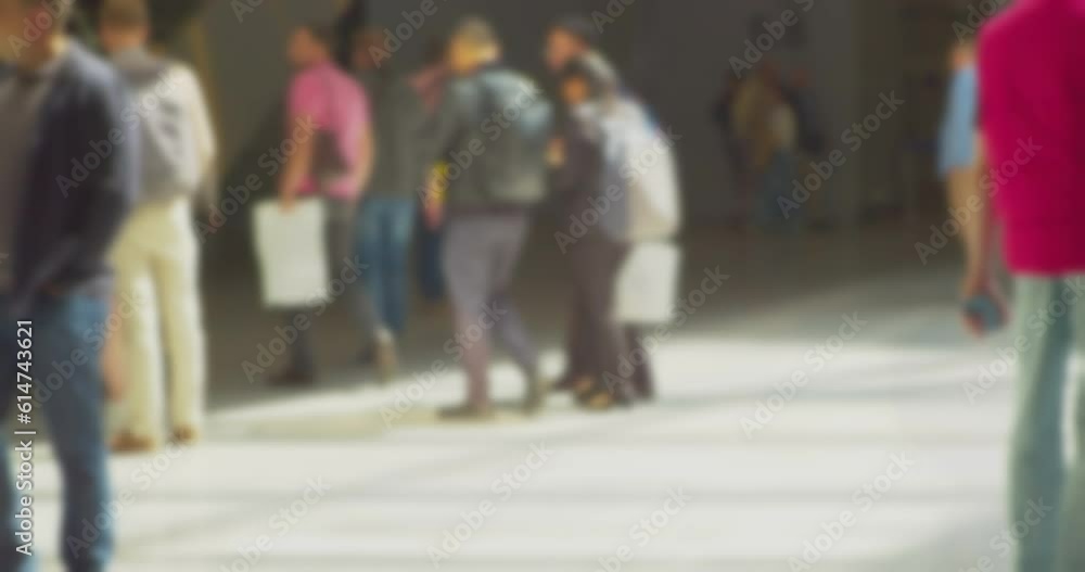 time lapse. modern business life in the city. defocused blurry video. background on the theme of business. blurry silhouettes of unrecognizable people moving fast in a large hall. time lapse. modern business life in the city. defocused blurry video. background on the theme of business. blurry silhouettes of unrecognizable people moving fast in a large hall.