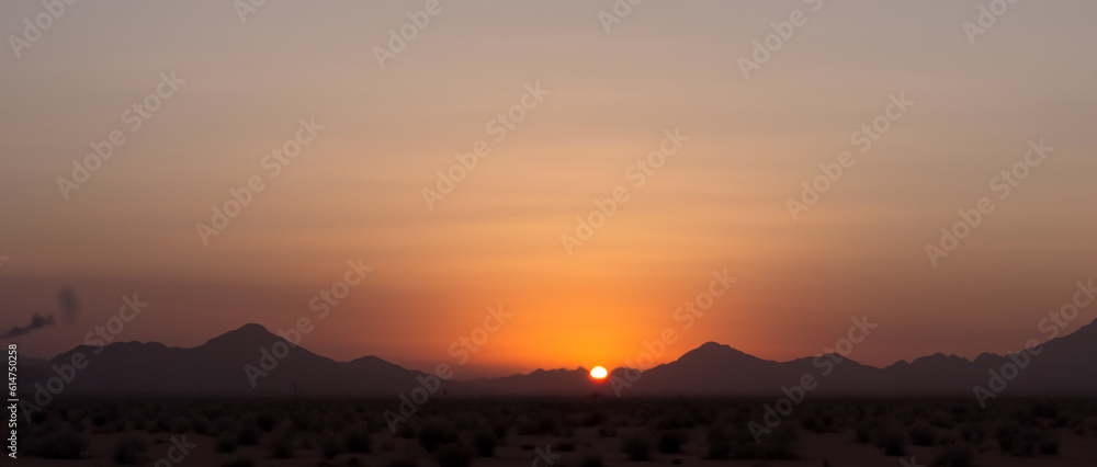 Smoky desert sunset.