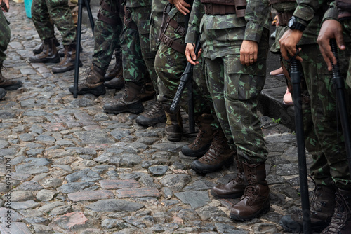 Military police officers stand guard during the civic independence parade of Bahia in Pelourinho, in Salvador.