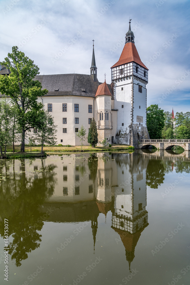 Mirror reflection of Blatna water castle in Bohemia
