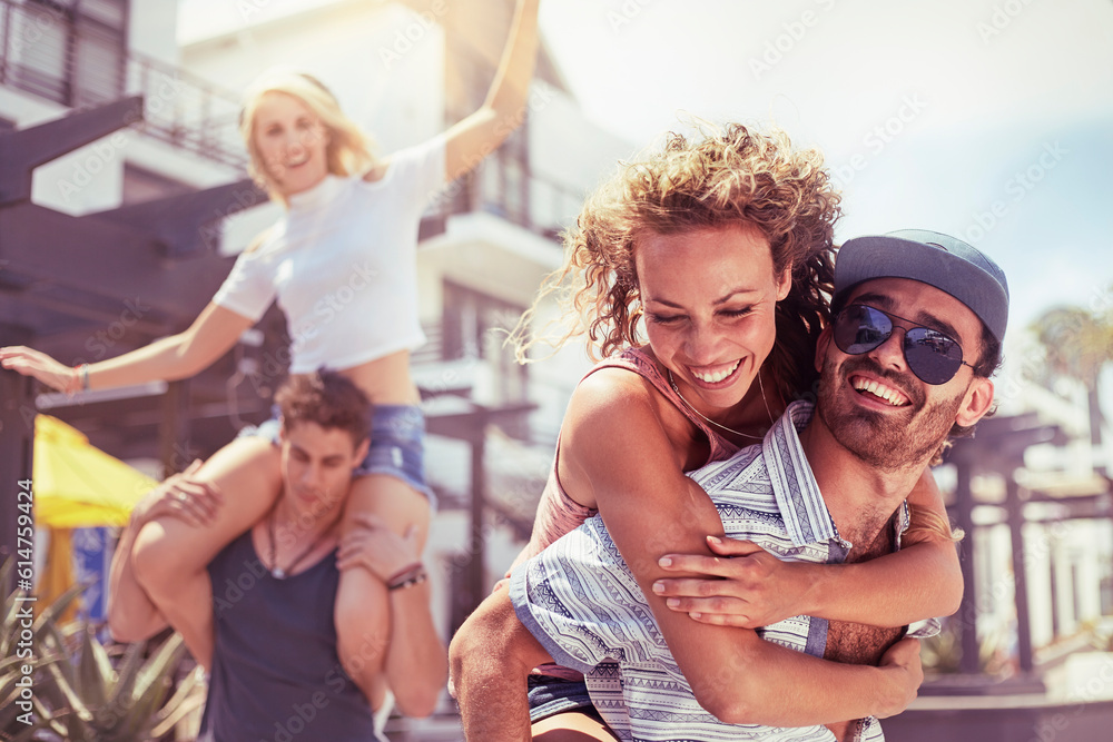 Fototapeta premium Playful couples piggybacking