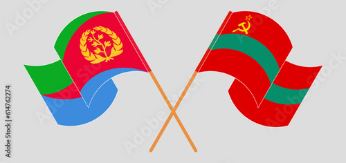 Crossed and waving flags of Eritrea and Transnistria