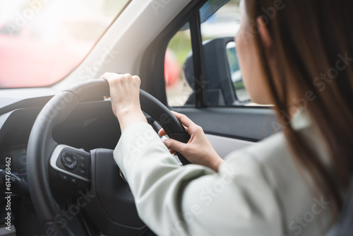 "Empowered Journey: A Confident Woman Takes the Wheel, Embracing the Freedom, Independence, and Adventure of Driving with Grace and Style"