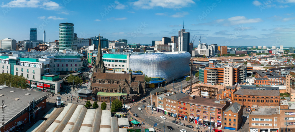 View of the skyline of Birmingham, UK including The church of St Martin, the Bullring shopping centre and the outdoor market.