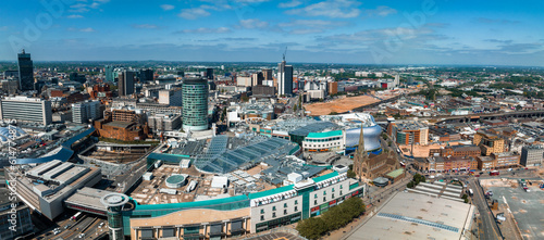 View of the skyline of Birmingham, UK including The church of St Martin, the Bullring shopping centre and the outdoor market.