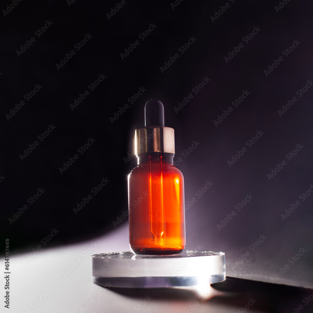 mockup of cosmetic aroma serum with pipette in brown bottle on transparent podium on black background with shadows. minimalist beauty cosmetic concept. mockup of cosmetic aroma serum with pipette in brown bottle on transparent podium on black background with shadows. minimalist beauty cosmetic concept.