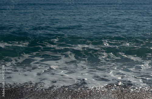 Sea waves on a sand beach