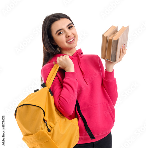 Portrait of female student with books on white background