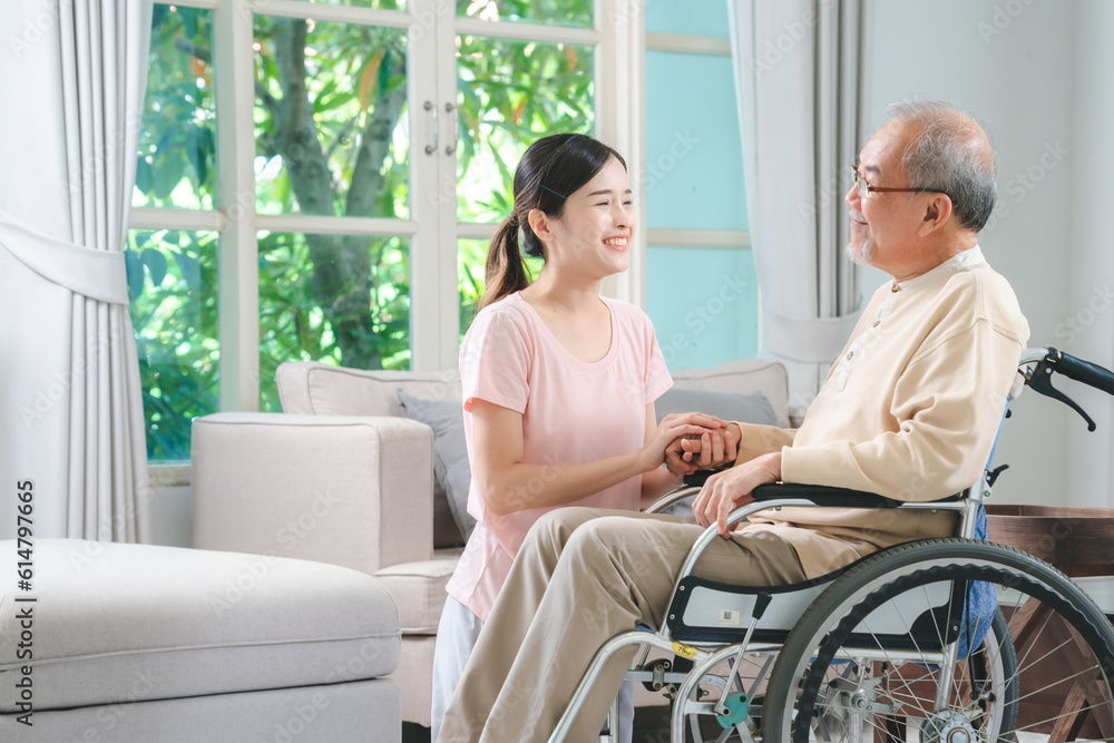 Asian family health care and insurance business at home concept, woman daughter take care support to senior elderly father patient in wheelchair together, dad having smile in happy love lifestyle Asian family health care and insurance business at home concept, woman daughter take care support to senior elderly father patient in wheelchair together, dad having smile in happy love lifestyle
