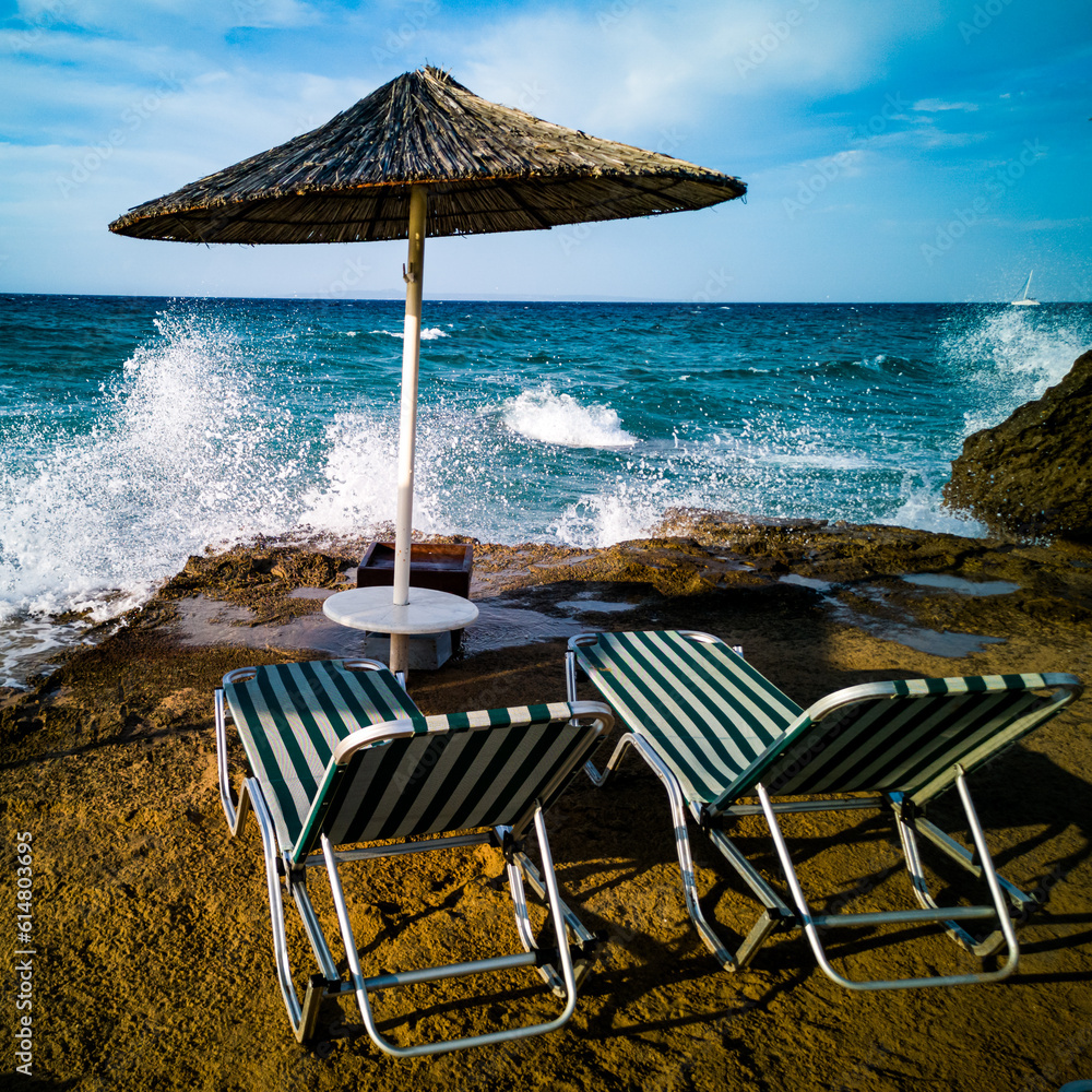 beach with umbrellas and chairs