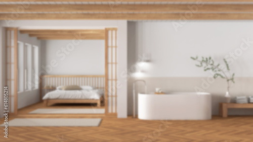 Blurred background, japandi bathroom and bedroom. Freestanding bathtub, master bed with duvet and herringbone parquet floor. Minimal interior design