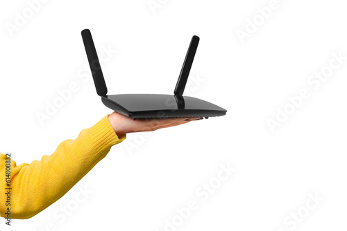 Quadro su tela black wifi router on hand isolated on transparent background