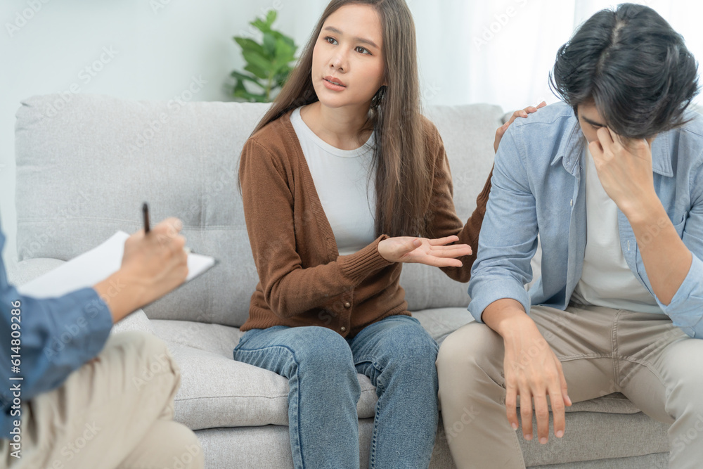 Couple support each while discussing family issues with psychiatrist. wife encourages and empathy husband suffers depression. psychological, divorce, trust, care, workplace and health issues.. Couple support each while discussing family issues with psychiatrist. wife encourages and empathy husband suffers depression. psychological, divorce, trust, care, workplace and health issues..