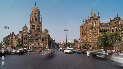 Timelapse view of traffic in front of historic landmarks BMC Building and Chhatrapati Shivaji Terminus aka Victoria Station in South Mumbai, Maharashtra, India.