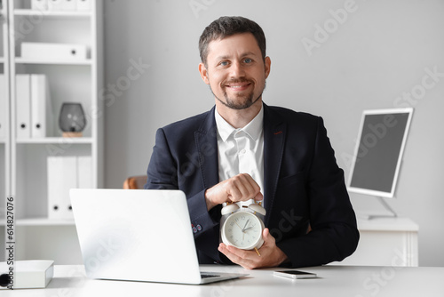 Young businessman with alar...