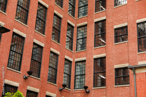 Brick buildings: icons of stability, progress, and community. Offices and apartment complexes symbolize growth, urban living, and shared aspirations