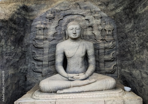 The Buddha statue in the temple photo