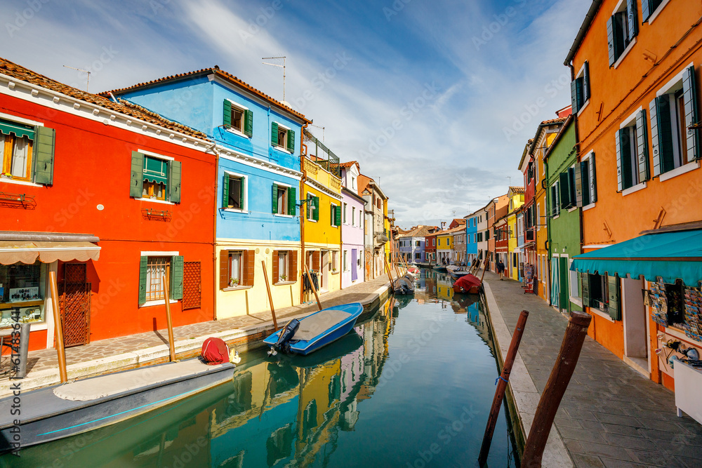 The Burano island near Venice, a canal between colorful houses, Italy, Europe.