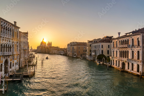 The Grand Canal in Venice with the Santa Maria della Salute basilica at a beautiful sunrise, Italy, Europe.