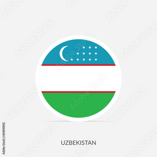 Uzbekistan round flag icon with shadow.