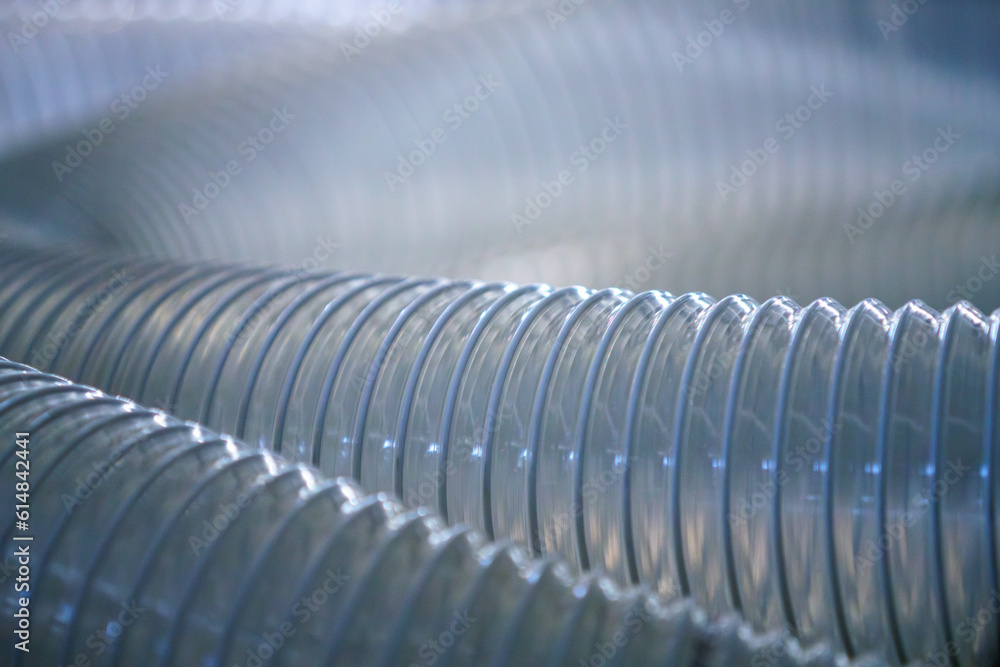 Flexible PUR antistatic suction hose for air conditioning, background flexi hose, industrial ventilation. Flexible PUR antistatic suction hose for air conditioning, background flexi hose, industrial ventilation.