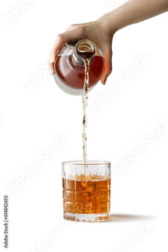 Woman pouring whiskey or cognac from bottle into glass on white background isolated transparent png