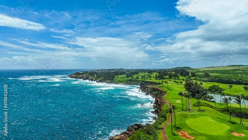 Flying over Hawaiian coastline to an aerial view of a scenic golf course