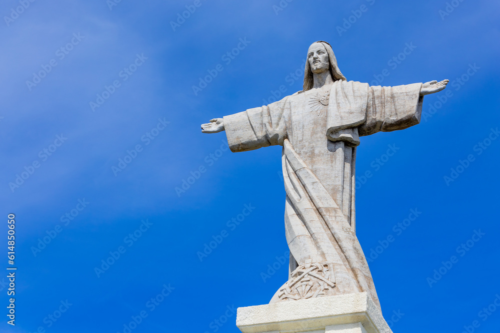 Statue of Jesus Christ with outstretched arms on the island of Madeira, Portugal. Statue of Jesus Christ with outstretched arms on the island of Madeira, Portugal.