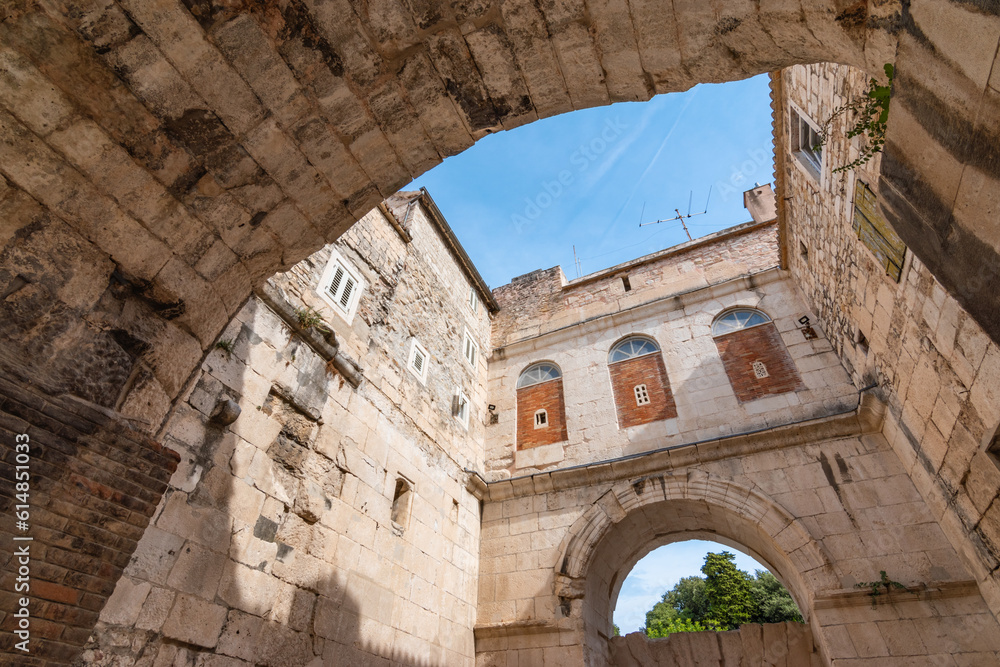 Ancient architecture of Diocletian's palace Golden Gate in old town of Split, Croatia. 