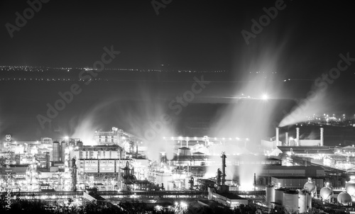 Fototapeta Naklejka Na Ścianę i Meble -  large smoke factory at night with long exposure