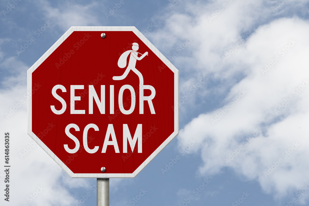 Senior Scam message on red street stop sign Senior Scam message on red street stop sign