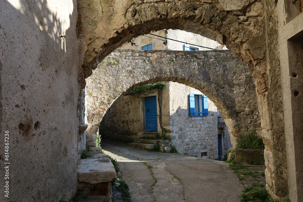 Village of Plomin, old abandoned houses in ancient town of Plomin, Croatia, street in the old town, old abandoned houses in ancient town of Plomin