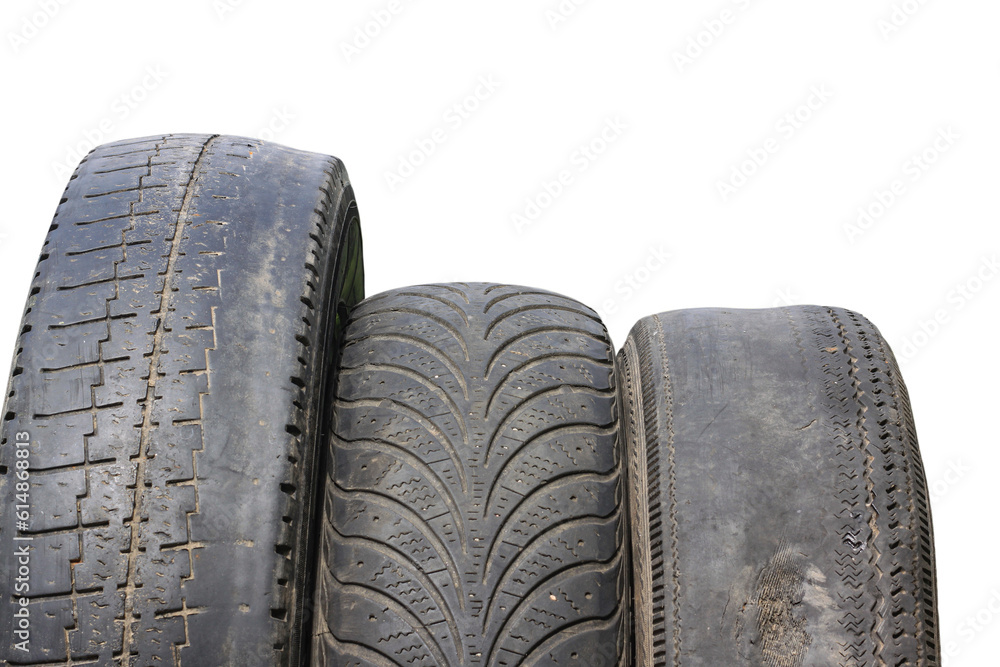 Obraz premium old worn damaged tires isolated on white background as pattern of damaged tire for advertising tire shop or car tire shop