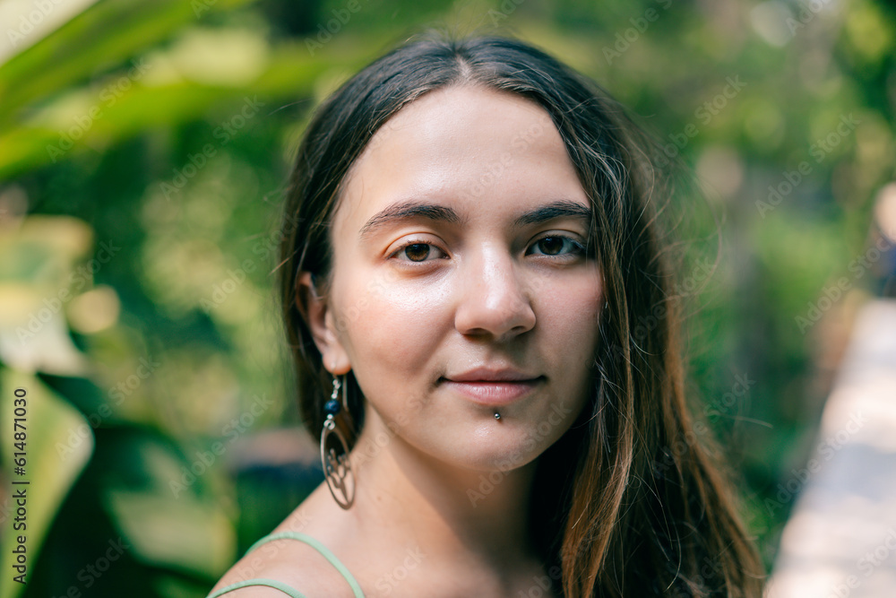 portrait of a young girl with a lip piercing portrait of a young girl with a lip piercing