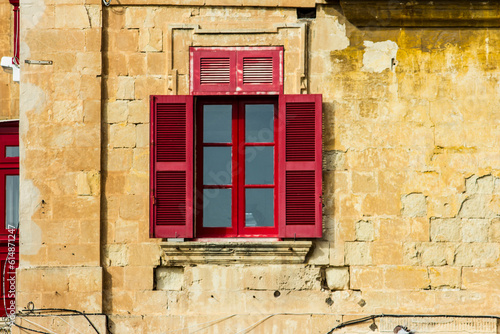 old window with shutters
