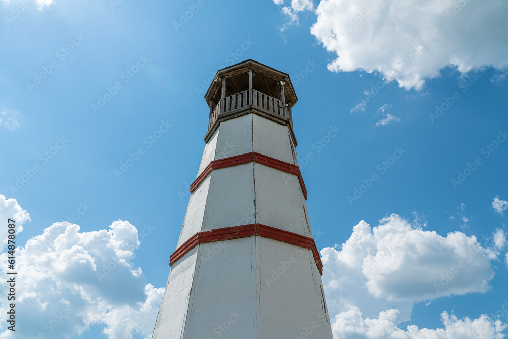 the old lighthouse against the blue sky the old lighthouse against the blue sky