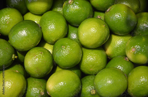 Texture of lime fruits in flat lay angle.