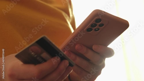 Wallpaper Mural Woman hands shopping online holding smartphone paying with credit card. Girl buying on Internet enter credit card details. Online shopping ecommerce delivery service Torontodigital.ca