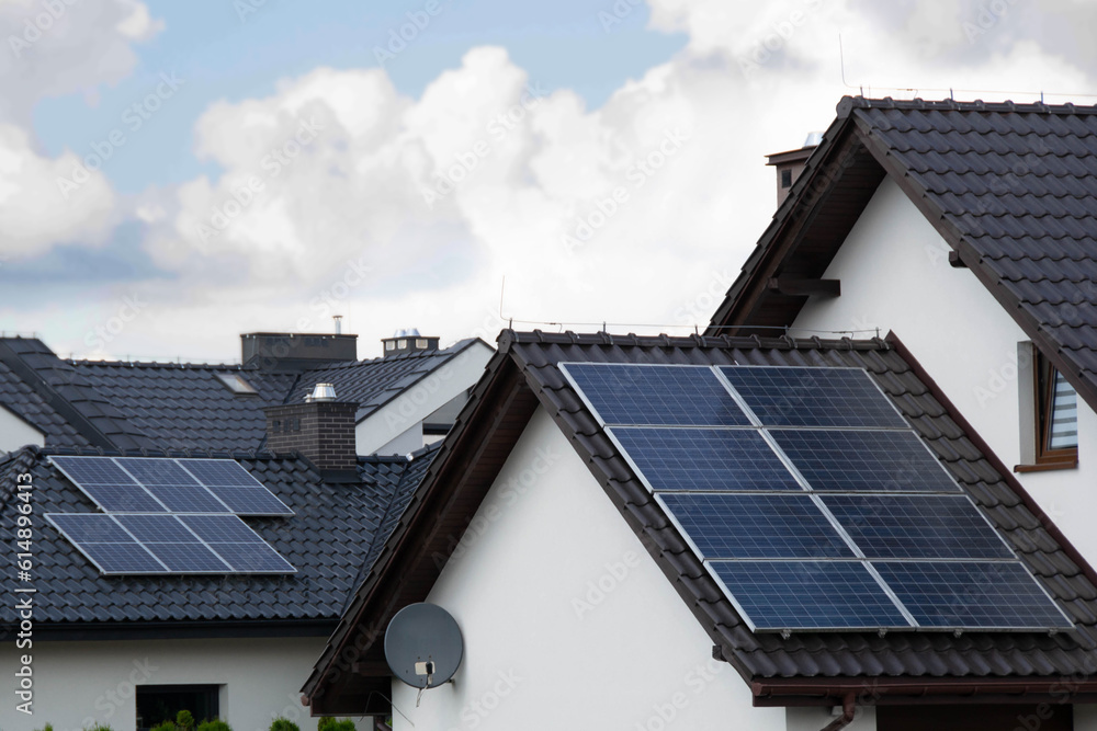 Fototapeta premium Installing a Solar Cell on a Roof.