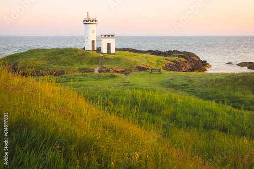 Scenic seascape landscape at sunset or sunrise of Elie Ness Lighthouse on the East Neuk Peninsula in coastal Fife  Scotland  UK.