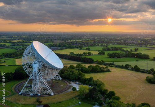 Goostrey, Cheshire, United Kingdom. 05.22.2023 Sunset reflects against the Lovell Telescope, Cheshire. Aerial Image. 22nd May 2023. photo