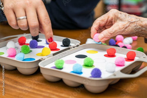 Rehabilitation center. Brain therapy cognitive psychological testing on senior patient. Alzheimer's disease and dementia prevention concept. Adaptation skills recovery. High quality photo